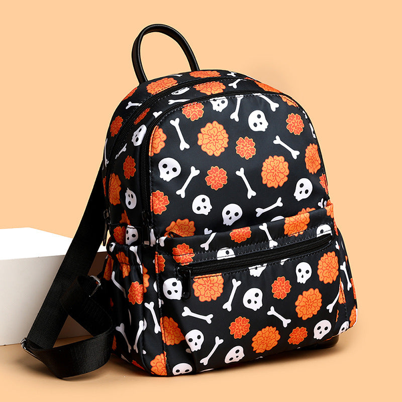 Zaino impermeabile di grande capacità con teschio di Halloween per donna con design multitasche e chiusura con cerniera