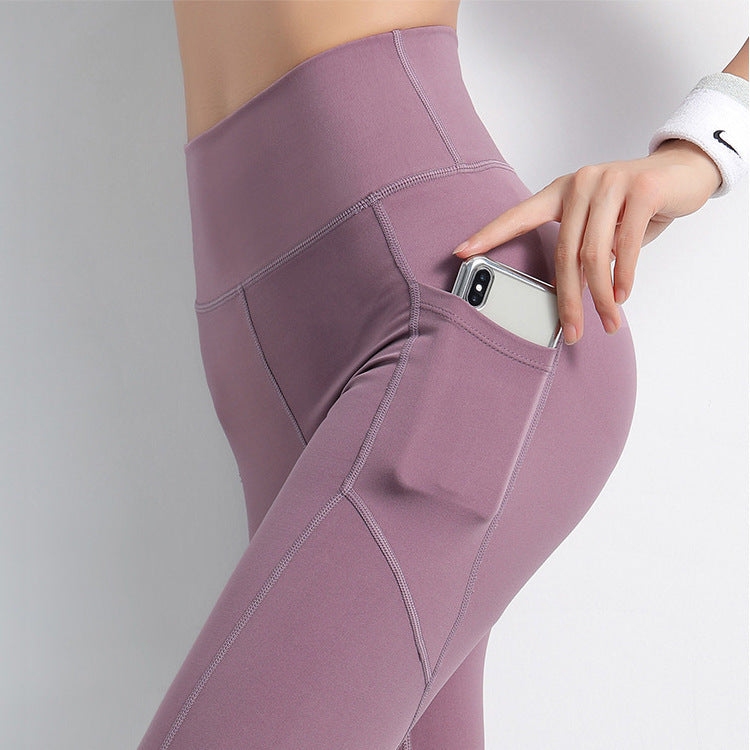 Elevate Your Fitness: Stylish Sports Leggings with Convenient Side Pockets