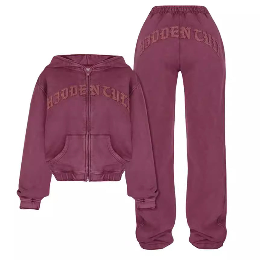 Trendiges Set aus kurzem Sweatshirt mit Reißverschluss und Kapuze und weiter Hose mit Kordelzug für Damen