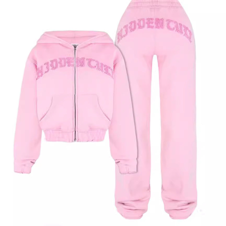 Trendiges Set aus kurzem Sweatshirt mit Reißverschluss und Kapuze und weiter Hose mit Kordelzug für Damen